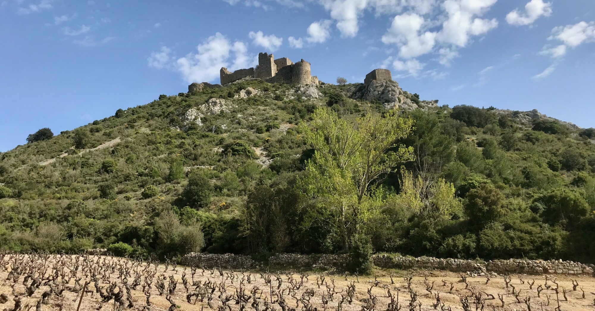 Aguilar Castle seen from below on Day 2 of the hike