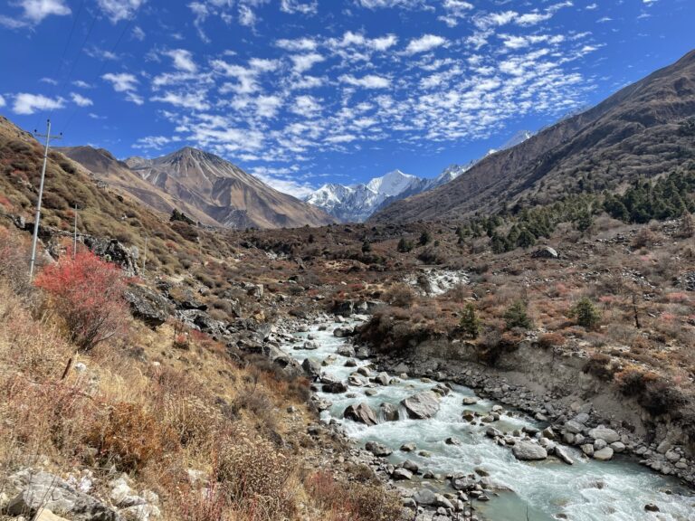 Snow capped peaks at the very bottom of Langtang Valley as seen from the path to Kyanjin